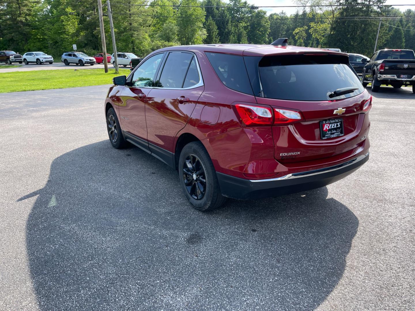 2018 Red /Black Chevrolet Equinox LT AWD (2GNAXSEV2J6) with an 1.5L I4 DOHC 16V TURBO engine, 6-Speed Automatic transmission, located at 11115 Chardon Rd. , Chardon, OH, 44024, (440) 214-9705, 41.580246, -81.241943 - This 2018 Chevrolet Equinox LT AWD with a 1.5L EcoTec Turbocharged engine and 6-speed automatic transmission offers a balanced blend of performance and fuel efficiency with a 30 MPG highway rating. This compact SUV is well-equipped for safety and convenience, featuring blind spot monitoring, rear cr - Photo#9